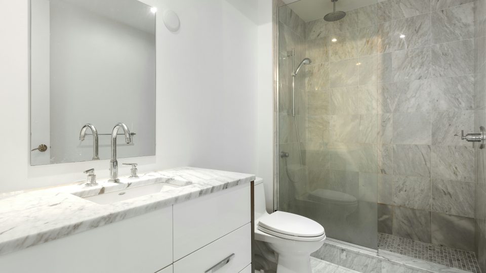 a bathroom with a glass shower